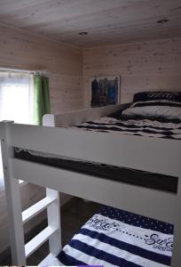 Postel nebo postele na pokoji v ubytování Tinyhaus BLÜCHER + 4 fotografie