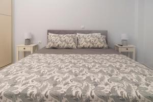 Postel nebo postele na pokoji v ubytování Simpli-city home
