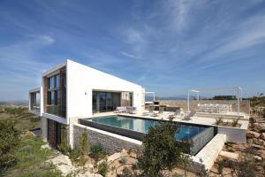 Bazén v ubytování Minthis Resort nebo v jeho okolí