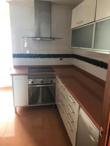Kuchyňa alebo kuchynka v ubytovaní Attic Valencia Beach