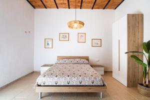 Кровать или кровати в номере Salenzia Apartment