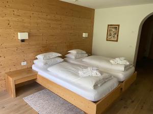 Postel nebo postele na pokoji v ubytování Hotel Gran Paradiso