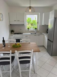 Kuchyň nebo kuchyňský kout v ubytování Apartment H&A