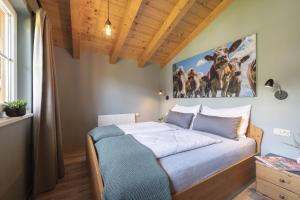 Postel nebo postele na pokoji v ubytování Feriendorf Wallenburg