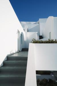 a staircase leading up to a white building at Santonero in Akrotiri
