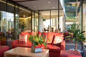 Posezení v ubytování Hotel Helvetia Intergolf