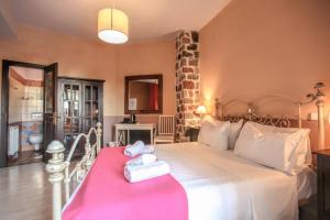 Postel nebo postele na pokoji v ubytování Mythos Guesthouse