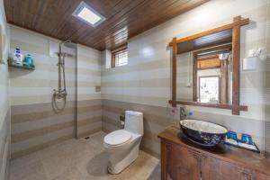 Kamar mandi di 丽江金美客栈
