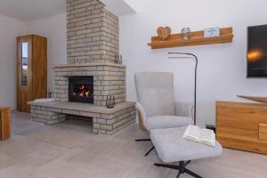 Μια τηλεόραση ή/και κέντρο ψυχαγωγίας στο Ferienhaus Stella Maris