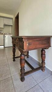 a wooden table in the middle of a kitchen at Villa Dimitra in Agios Dimitrios