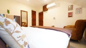 Postel nebo postele na pokoji v ubytování Walisons Homestay Abelia