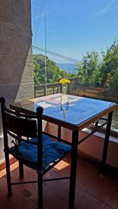 Stolní tenis v ubytování Yemanya Hostal nebo okolí