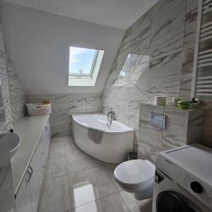 Kúpeľňa v ubytovaní Apartament 112