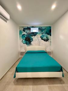 Un pat sau paturi într-o cameră la Casa del Sole