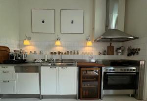 Kuchyň nebo kuchyňský kout v ubytování WS77 B&B Apartment