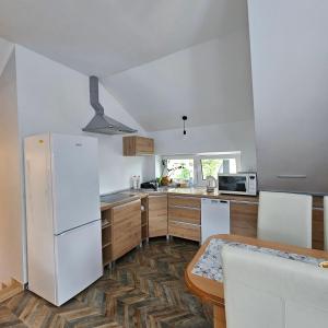 Kuchyňa alebo kuchynka v ubytovaní Apartament 112