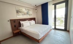Postel nebo postele na pokoji v ubytování ERTAN OTEL