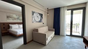 Postel nebo postele na pokoji v ubytování ERTAN OTEL