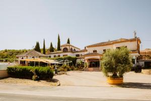 a large building with aasteryasteryasteryasteryasteryasteryasteryasteryasteryasteryastery at Escua in Archidona