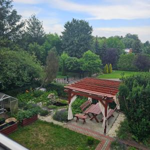 Vonkajšia záhrada v ubytovaní Apartament 112