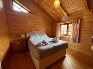 Postel nebo postele na pokoji v ubytování Low Alwinton Holiday Cottages