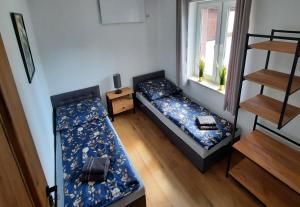 Ένα ή περισσότερα κρεβάτια σε δωμάτιο στο Loft na Strumyku