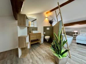 Postel nebo postele na pokoji v ubytování Chambre de charme à Evisa
