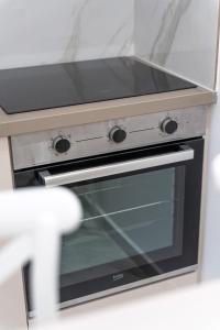 Kuchyň nebo kuchyňský kout v ubytování Meraki Home