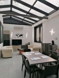 a large dining room with a table and chairs at Best Western Cavalieri Della Corona in Cardano al Campo