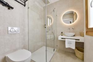 a bathroom with a shower and a toilet and a sink at MIMAR ALTEA ROOMS - Tranquil in Altea