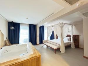 Postel nebo postele na pokoji v ubytování ERTAN OTEL + 37 fotografií