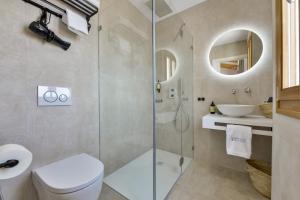 a bathroom with a shower and a toilet and a sink at MIMAR ALTEA ROOMS - Tranquil in Altea