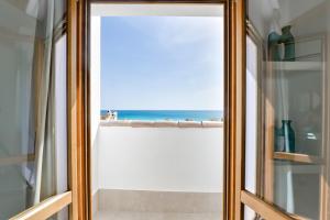 a window with a view of the ocean at MIMAR ALTEA ROOMS - Tranquil in Altea