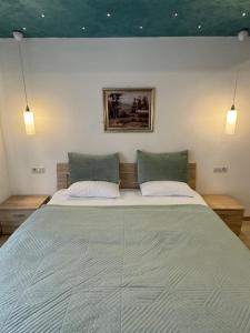 Postel nebo postele na pokoji v ubytování Gardenia Hotel & Spa