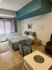 Postel nebo postele na pokoji v ubytování Gardenia Hotel & Spa