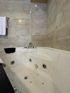 Koupelna v ubytování Gardenia Hotel & Spa