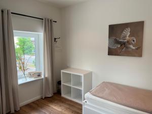 Postel nebo postele na pokoji v ubytování Elb Nest Gästehaus