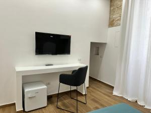 TV a/nebo společenská místnost v ubytování Le Stanze Ritrovate