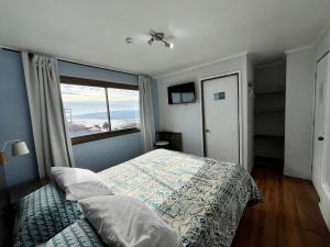 Postel nebo postele na pokoji v ubytování Yemanya Hostal