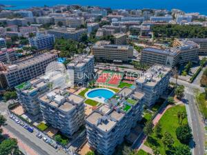 an aerial view of a city with tall buildings at UHC Larimar Family Complex in Salou