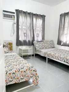 Giường trong phòng chung tại Casas Bugambilias Door 1