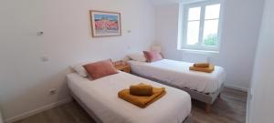 Postel nebo postele na pokoji v ubytování Villa Barriere - Maison a 25m de la Grande plage