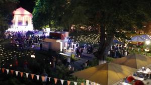 an overhead view of a crowd of people at an event at night at Beauty Haus im Zentrum in Bad Sooden-Allendorf