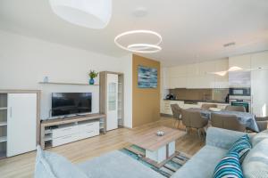 Μια τηλεόραση ή/και κέντρο ψυχαγωγίας στο Blue Apartman Szántód