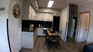Kuchyň nebo kuchyňský kout v ubytování Arianas apartment