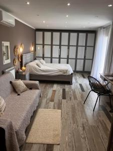 Postel nebo postele na pokoji v ubytování HISTOIRE D'Ô - Les Piscines - Chambres d'hôtes