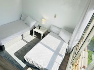 Postel nebo postele na pokoji v ubytování Madinaty Relaxation + 37 fotografií