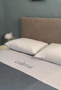 Postel nebo postele na pokoji v ubytování Calma Resort
