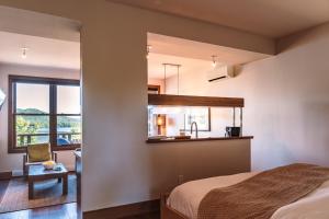 Postel nebo postele na pokoji v ubytování Lakefront, Mountain View - Resort Loft