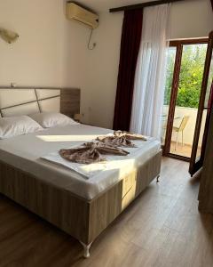Voodi või voodid majutusasutuse Rooms Ajllin toas